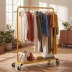 Sywhitta Clothes Rack on wheels, Clothing Rack with Bottom Mesh Storage Shelf,Sturdy Metal Frame,Rolling Garment Rack for Hanging Clothes,Coats,Skirts,39.76" L x 16" W x 64.56" H,Golden - Image 2